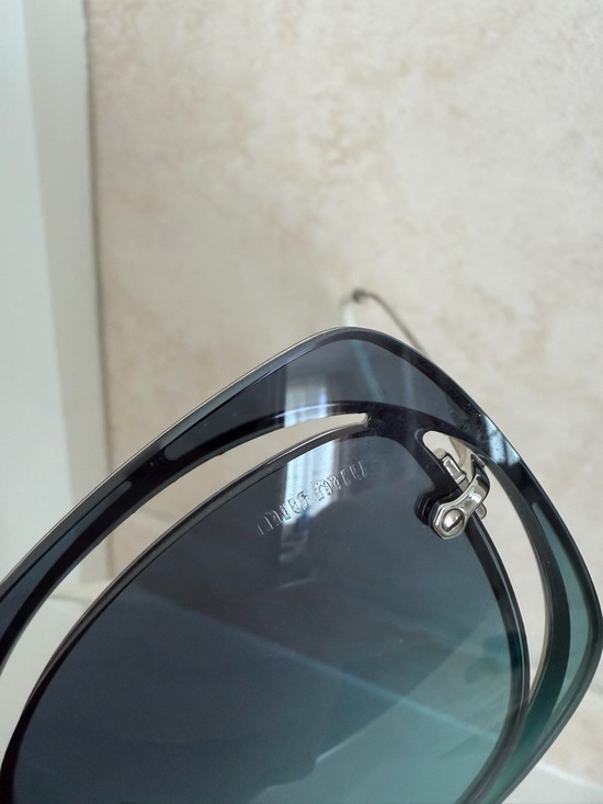 Miu Miu Women\'s Gradient Blue Cut Out Sunglasses SMU54S main image 7